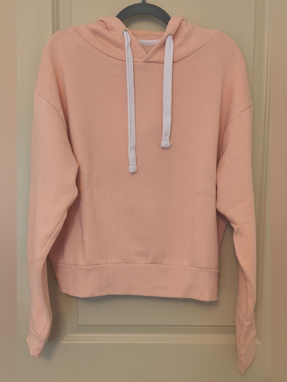 Reflex Light Pink Pullover Hoodie with White Drawstrings